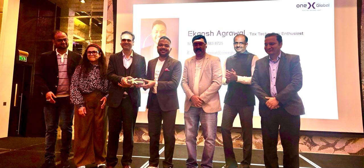 Ekansh Agrawal receiving recognition at a One X Global event